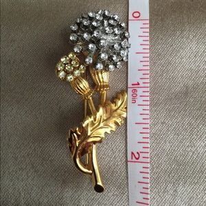 Joan Rivers gold with crystal brooch